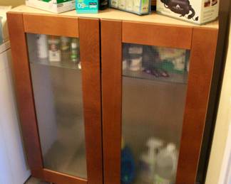 Storage cabinet with matching smaller cabinet