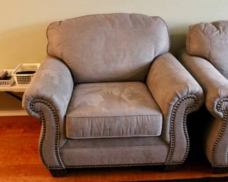Light gray studded loveseat