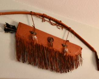 Hanging bow and arrow decor