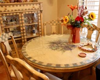 Adorable round dining table with 4 chairs and floral designs