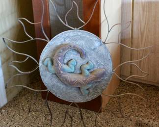 Hanging sun and lizard outdoor decor