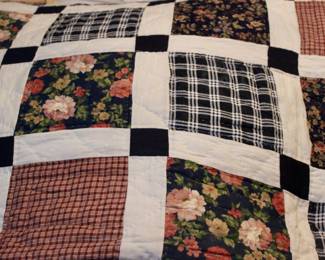 Handmade floral patterned quilt