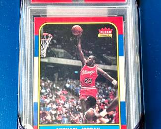 Michael Jordan Card 1986 Fleer Rookie Card. Near mint to mint condition with perfect corners. PSA 8. The greatest player and most significant card of all time!! For more information on this card call 480-577-8396 or text. It will not be physically at the sale.
