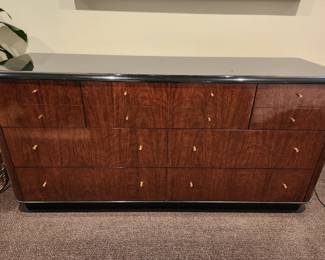 Available for Presale: B2 Black & Brown Drexel Heritage Furnishings. Black Lacquered Top & Wood Veneer.  7 Drawers and comes with Black Mirror. Top Lacquered Has Minor Chips on it. Dresser: 30" H x 64" W x 19" D. Mirror: 46"H x 31"W.