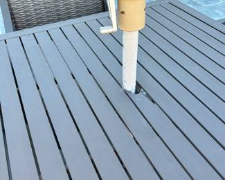 Available for Presale. O1- 4 Wicker Chairs & Metal Table with Umbrella. Tops of Chair backs have wear & tear. Slight hole on top of table where umbrella is. 42"D x 41"W x H 29". Chair Back 34"Hx W9" x D19". Seat 20"