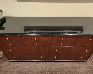 Available for Presale: B2 Black & Brown Drexel Heritage Furnishings. Black Lacquered Top & Wood Veneer.  7 Drawers and comes with Black Mirror. Top Lacquered Has Minor Chips on it. Dresser: 30" H x 64" W x 19" D. Mirror: 46"H x 31"W.