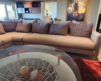 Available for Presale: C2- Elle Sectional, Dellarobbia Sectional with metal legs – purchased  from Cantoni Furniture, Dallas, TX. Very minor flaws on corner (please see photo details) – Retails for $12,000.00. R Exterior- Center 10'. Corner to L Exterior-10'. D 3'. Seat H: 15" Back H: 30"
Covered the front sectional pillows with Henry Calvin fabric (33 yds #10245 purchased) – for fabric – (extra fabric is available to go with the sectional).