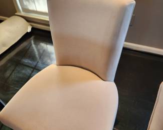 Available for Presale: Velvet Dining Room Chairs, Set of 8. Back H 34", Seat H 18", W 20" x D 17"  Some very minor staining, please inspect the chairs closely in each picture. Price reflects minor flaws. 8 Mike Tabac armless side chairs with custom sand velvet fabric and Antique bronze nail head trim purchased in 1998 from Gary Mertins Design, Inc
 