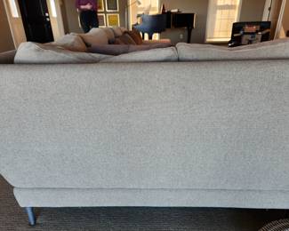 Available for Presale: C2- Elle Sectional, Dellarobbia Sectional with metal legs – purchased  from Cantoni Furniture, Dallas, TX. Very minor flaws on corner (please see photo details) – Retails for $12,000.00. R Exterior- Center 10'. Corner to L Exterior-10'. D 3'. Seat H: 15" Back H: 30"
Covered the front sectional pillows with Henry Calvin fabric (33 yds #10245 purchased) – for fabric – (extra fabric is available to go with the sectional).