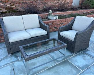 Available for Presale 02: Belvedere Manufactured Wicker Love Seat, Side Chair, Coffee Table with glass top & 2 Side Tables with glass top (wicker is deteriorating on the Love Seat and Chair; tables seem to be OK).  Loveseat H 37" x W 53" x D 21". Side Chair: 37" x 29" x 21". Cushions not included. 