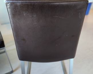 Available for Presale: C3- 6 Armless side chairs by Blueprint Furniture, Los Angeles, CA . Coffee leather, satin finish steel base. There are some very minor scratches on the chairs that could be. Leather could eliminate many of the minor scratches. Please inspect each photo carefully.  Back 34"H, Seat 19" H, W19" x D 17" 