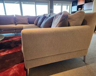 Available for Presale: C2- Elle Sectional, Dellarobbia Sectional with metal legs – purchased  from Cantoni Furniture, Dallas, TX. Very minor flaws on corner (please see photo details) – Retails for $12,000.00. R Exterior- Center 10'. Corner to L Exterior-10'. D 3'. Seat H: 15" Back H: 30"
Covered the front sectional pillows with Henry Calvin fabric (33 yds #10245 purchased) – for fabric – (extra fabric is available to go with the sectional).