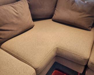 Available for Presale: C2- Elle Sectional, Dellarobbia Sectional with metal legs – purchased  from Cantoni Furniture, Dallas, TX. Very minor flaws on corner (please see photo details) – Retails for $12,000.00. R Exterior- Center 10'. Corner to L Exterior-10'. D 3'. Seat H: 15" Back H: 30"
Covered the front sectional pillows with Henry Calvin fabric (33 yds #10245 purchased) – for fabric – (extra fabric is available to go with the sectional).