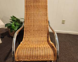 Available for Presale: C4 Rattan Rocking Chair with Chrome Handles. Minimal Damage of Sides. H (back of chair): 43" x D 22" x W 21" x H (seat) 19" 