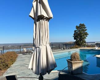 Available for Presale. O1- 4 Wicker Chairs & Metal Table with Umbrella. Tops of Chair backs have wear & tear. Slight hole on top of table where umbrella is. 42"D x 41"W x H 29". Chair Back 34"Hx W9" x D19". Seat 20"