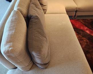 Available for Presale: C2- Elle Sectional, Dellarobbia Sectional with metal legs – purchased  from Cantoni Furniture, Dallas, TX. Very minor flaws on corner (please see photo details) – Retails for $12,000.00. R Exterior- Center 10'. Corner to L Exterior-10'. D 3'. Seat H: 15" Back H: 30"
Covered the front sectional pillows with Henry Calvin fabric (33 yds #10245 purchased) – for fabric – (extra fabric is available to go with the sectional).