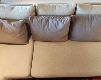 Available for Presale: C2- Elle Sectional, Dellarobbia Sectional with metal legs – purchased  from Cantoni Furniture, Dallas, TX. Very minor flaws on corner (please see photo details) – Retails for $12,000.00. R Exterior- Center 10'. Corner to L Exterior-10'. D 3'. Seat H: 15" Back H: 30"
Covered the front sectional pillows with Henry Calvin fabric (33 yds #10245 purchased) – for fabric – (extra fabric is available to go with the sectional).