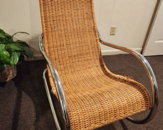 Available for Presale: C4 Mid Century Italian Rattan Rocking Chair with Chrome Handles. Minimal Damage of Sides. H (back of chair): 43" x D 22" x W 21" x H (seat) 19" 