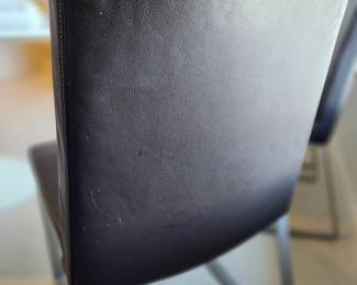 Available for Presale: C3- 6 Armless side chairs by Blueprint Furniture, Los Angeles, CA . Coffee leather, satin finish steel base. There are some very minor scratches on the chairs that could be. Leather could eliminate many of the minor scratches. Please inspect each photo carefully.  Back 34"H, Seat 19" H, W19" x D 17" 