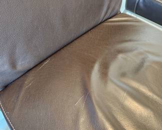 Available for Presale: C3- 6 Armless side chairs by Blueprint Furniture, Los Angeles, CA . Coffee leather, satin finish steel base. There are some very minor scratches on the chairs that could be. Leather could eliminate many of the minor scratches. Please inspect each photo carefully.  Back 34"H, Seat 19" H, W19" x D 17" 