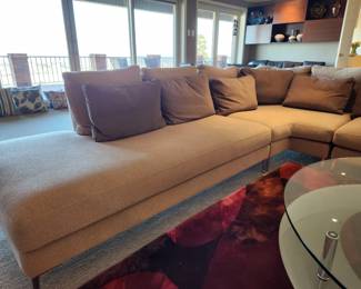 Available for Presale: C2- Elle Sectional, Dellarobbia Sectional with metal legs – purchased  from Cantoni Furniture, Dallas, TX. Very minor flaws on corner (please see photo details) – Retails for $12,000.00. R Exterior- Center 10'. Corner to L Exterior-10'. D 3'. Seat H: 15" Back H: 30"
Covered the front sectional pillows with Henry Calvin fabric (33 yds #10245 purchased) – for fabric – (extra fabric is available to go with the sectional).