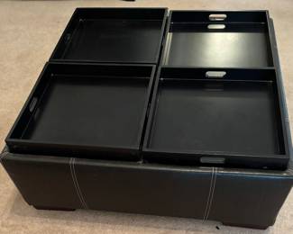 coffee table with trays and storage underneath