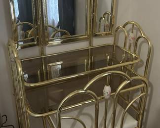 brass and glass make up table with chair