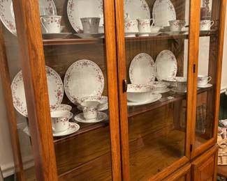 Wooden china cabinet with drawers and cabinets