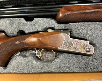 HEAVILY ENGRAVED 12GA.