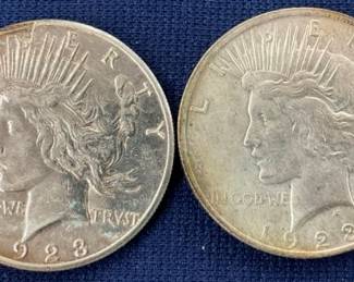 1923'S TONED PEACE SILVER DOLLARS
