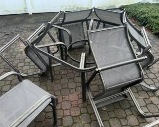 Serviceable outdoor Chairs and Table... top is somewhere I think