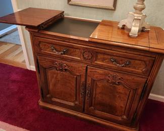 1 of 2 pictures - Henderdon serving/cabinet (dual fold out tops). In Great condition!
