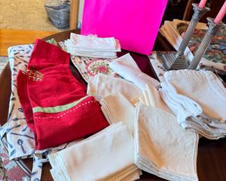 Bright pink gift bag of cloth napkins, aprons