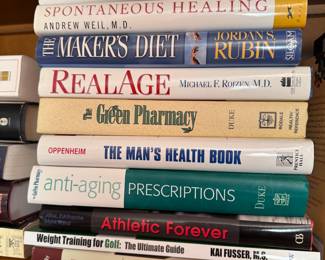 Group of books including Real Age by Michael Rojzen