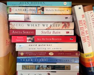 Group of books including Stones from the River by Ursula Hegi