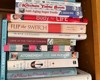 Group of books including When I Fall In Love by Iris Rainer Dart