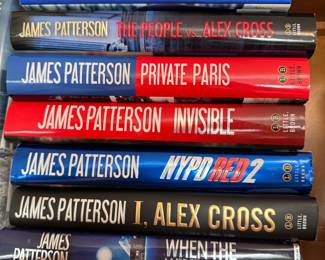 Group of books including When the Wind Blows by James Patterson