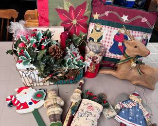 Box Lot 57 tote of pillows, wire basket, and decorations