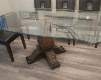 Custom made glass top dinning table....$1200.00, PLEASE look at the daily discount schedule to see your daily discount on this item