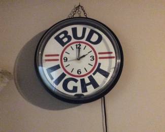 Bud light sign lights up red and clock works!
