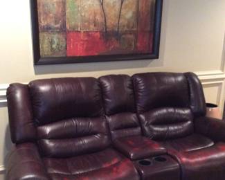 Two seat rocker recliner in "Cheers" design, the redware is normal to design