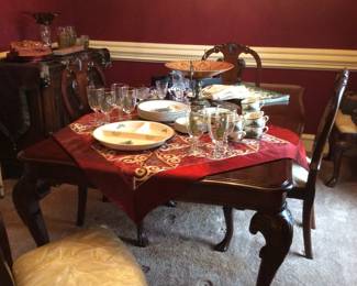 Dining Chairs still have original plastic cover, table has 2 leafs