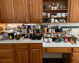 Lots of mugs, plates, bowls, and misc.