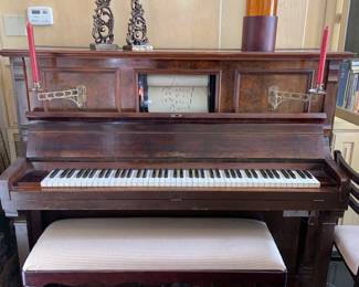 player piano and rolls