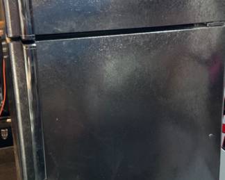 *Pre-sale item GE black two door refrigerator freezer on top.               