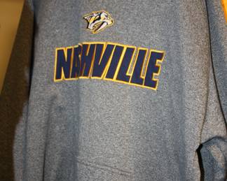 Several Predators Hoodies and Jerseys