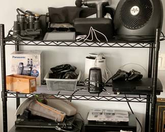 Vornado Fan, Drone, Massage Gun, Wahl Hair Clippers, Binoculars, Panasonic Cordless Phone Set, JVC 5 disc CD player, Insignia Blu-ray, PlayStation 3, Sentry Safe, Neck Massager etc….