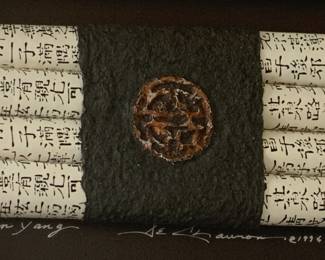 Four bound scrolls bound and framed.