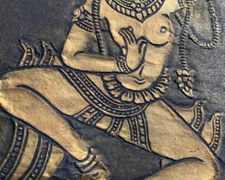 Embossed gilded print.