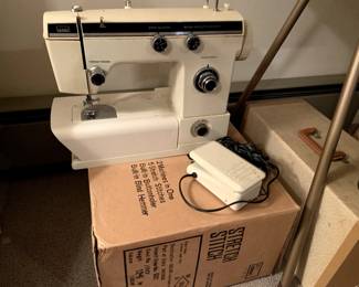 A second sewing machine, younger than the first.